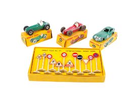 Three Dinky diecast racing cars and a set of No.771 International Road Signs. Comprising a No.