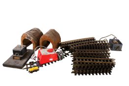 An assortment of LGB G Gauge track and layout accessories.