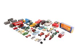 A collection of assorted playworn diecast vehicles.