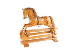 A model traditional wooden rocking horse.