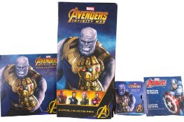 An assortment of Avengers collectables.