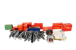 An assortment of 00 gauge layout accessories. Including a boxed pack of Tri-ang R.