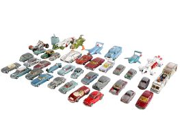 A collection of playworn Dinky vehicles. Including a Thunderbird 2, No.108 Sams' Car, No.