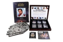 An assortment of Star Wars collectables.