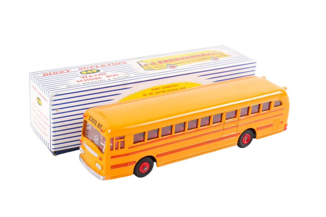 A Dinky Supertoys No.949 Wayne School Bus. Deep yellow body, red lines, red plastic hubs. - Image 1 of 3