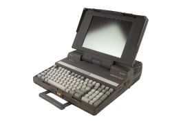 A vintage Toshiba T5200/100 portable 'laptop' computer. Model No: PA8052UK, Serial No.
