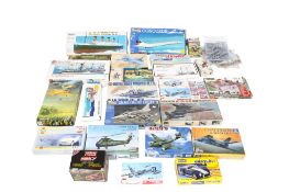 A collection of model vehicle kits. Including a Revell 1:32 scale No.