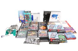 An assortment of games consoles and games.