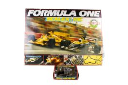 A Hornby Formula One 'Silverstone' Scalextric set and a Scalextric Racing Truck model. The set C.