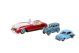 Three vintage model cars.