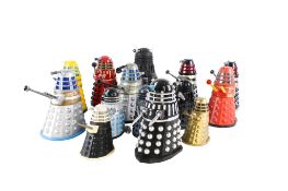 A collection of vintage Doctor Who Dalek models.