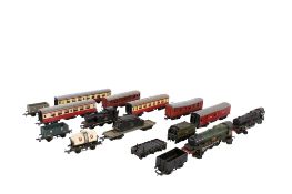 An assortment of 00 gauge Tri-ang locomotives, freight stock and coaches.