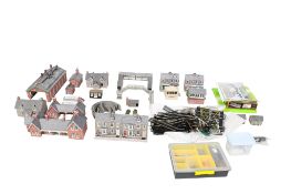 A collection of scratchbuilt 00/H0 gauge card layout accessories.