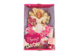 A 1990s Mattel Barbie 'Crystal'. In the original window box, contents appear complete but unchecked.