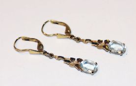 Paar 14 k Gelbgold Ohrhänger mit Aquamarin, L 3,8 cm, 3 gr.