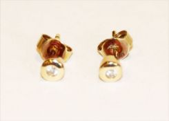 Paar 14 k Gelbgold Diamant-Ohrstecker, 1,35 gr.