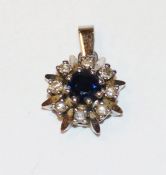 14 k Weißgold Anhänger mit Safir und 8 Diamanten, 2,2 gr.