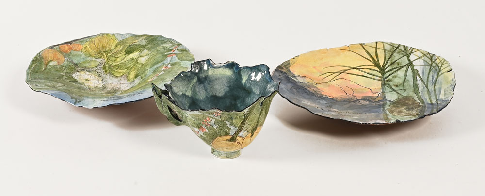 Claudia Clare (British born 1962), a teacup saucer and plate "The Tea-Leaf's Tale" from The World