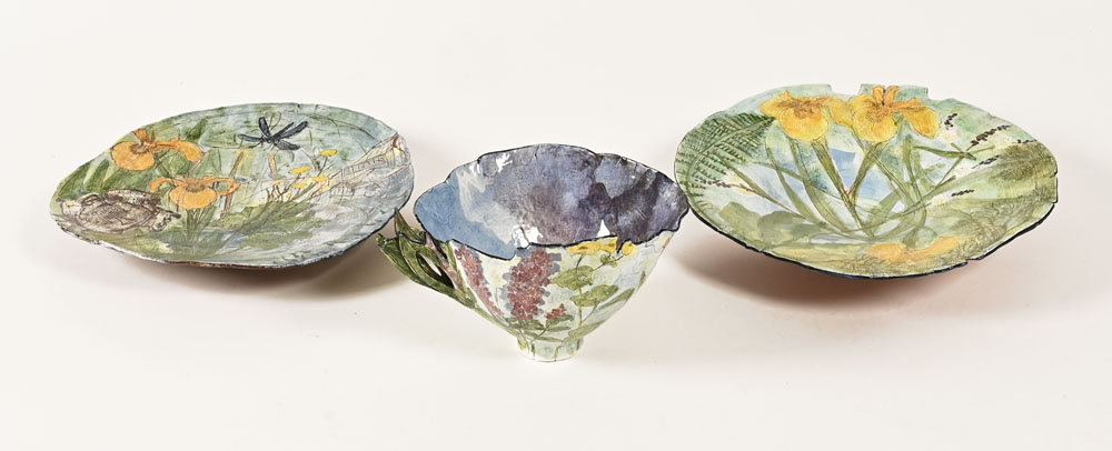 Claudia Clare (British born 1962), a teacup saucer and plate "The Damp Patch" from The World Service