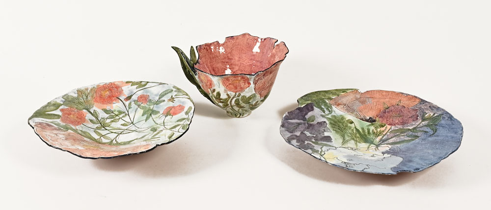 Claudia Clare (British born 1962), a teacup saucer and plate "The Rose Bowl" from The World