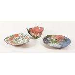 Claudia Clare (British born 1962), a teacup saucer and plate "The Rose Bowl" from The World