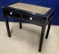 A Vietnamese black lacquered side table, the raffia style top,