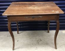 A 19th Century French fruitwood single drawer side table in the Louis XV Provincial taste,