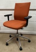 A Vitra 'Access' swivel office chair with terracotta upholstery,