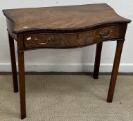 A George III mahogany serpentine fronted side table of small proportions,