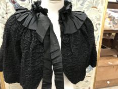 A box containing a late 19th Century black cape, a mink coat (bust approx 90 cm),