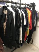 A large collection of ladies clothing to include COS, Diane Von Furstenberg, Ralph Lauren, Miu Miu,