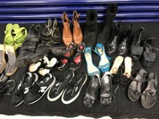 Three boxes, the first containing fourteen pairs of shoes and three pairs of boots, size 36,