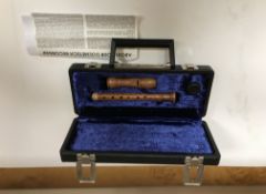 A vintage Dolmetsch pear wood recorder,