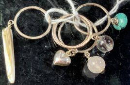 A set of five silver stacking rings feat