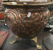 A late Victorian embossed copper and bra