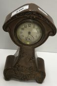 A late 19th Century embossed copper case