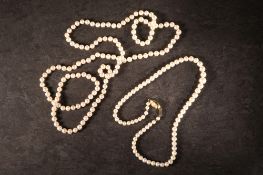 Two single strand cultured pearl necklac