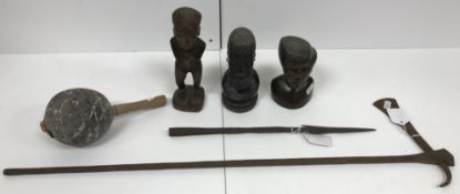 A Makonde carved wooden and metal inlaid