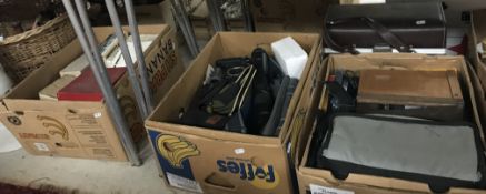 Three boxes of assorted camera equipment, lenses, etc,