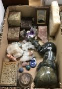 A box containing various hardstone ornaments to include hippo, bear,