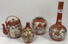 A collection of four pieces of Meiji period Japanese kutani porcelain including onion shaped vase