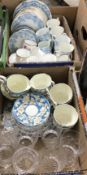 A box containing a Paragon blue and floral decorated part tea set,