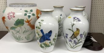 A collection of four Franklin Porcelain vases decorated with birds including 