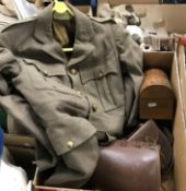 An Army Service Corps jacket with lapel badge, together with leather gaiters,
