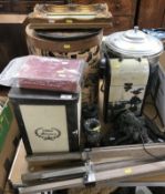 A collection of items including a modern standard lamp of spotlight form,