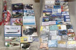 Two boxes containing a large collection of mainly military plane related model kits to include
