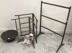 A mid 20th Century doll with composite head and arms and padded body and legs,