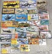 A box containing assorted vintage and newer Airfix and other model kits to include RAF Recovery set