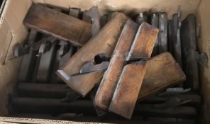 A box of assorted antique moulding planes, variously stamped including 