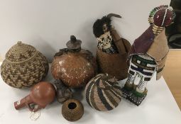 A collection of various tribal items to include a red pottery gourd-shaped jug, South Sudan / Congo,